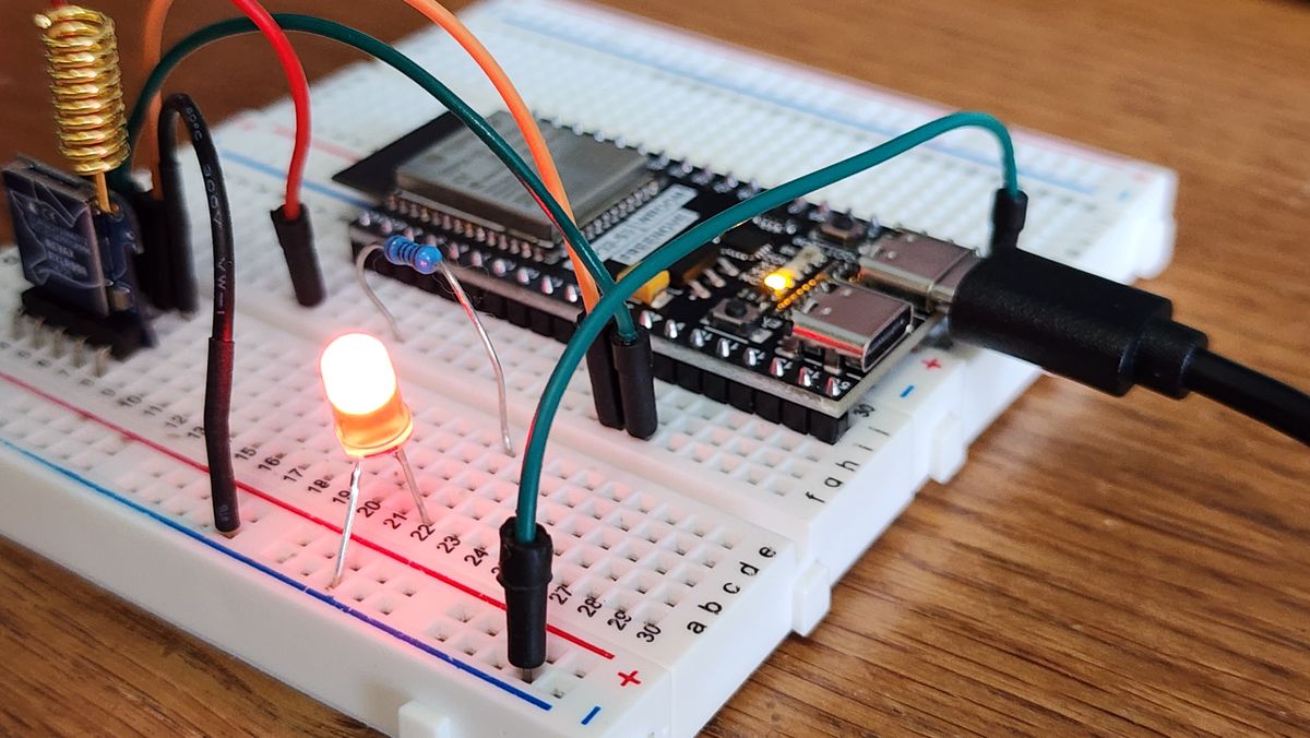 Close-up of electronics breadboard with components