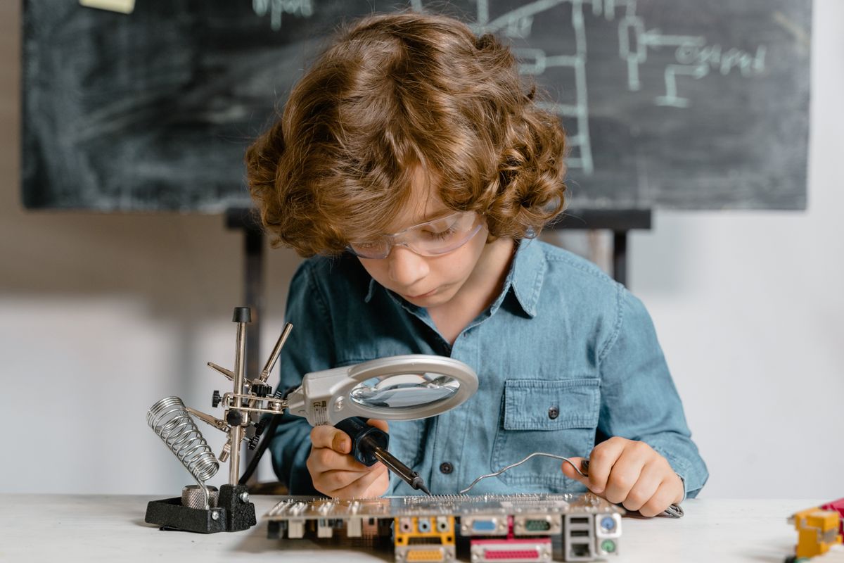 Kids working on electronics and Arduino projects